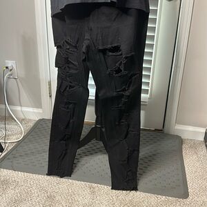 Black cut up jeans